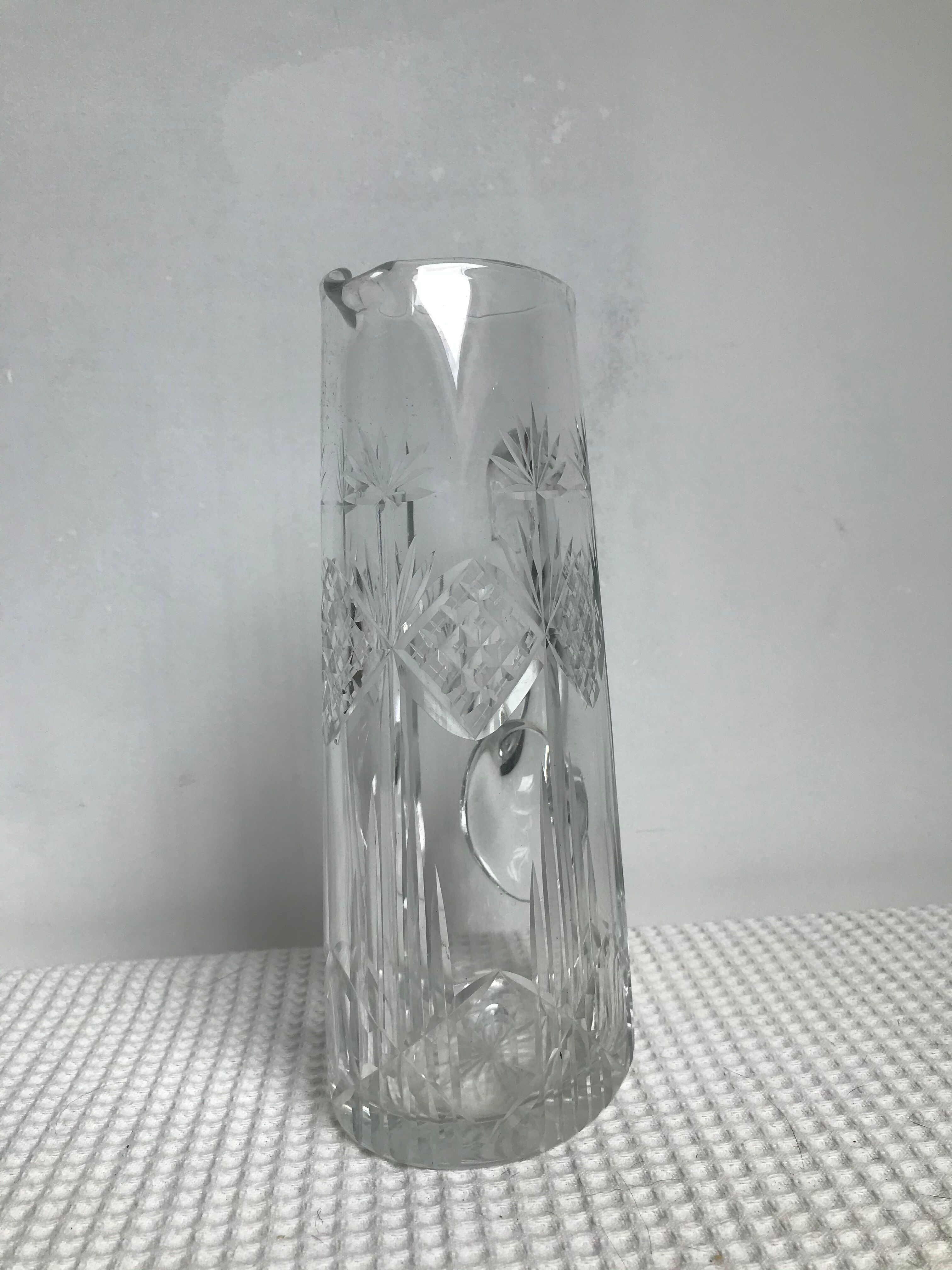 Engraved glass pitcher