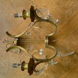 Art deco wall lamp with beveled stamps in gilded brass