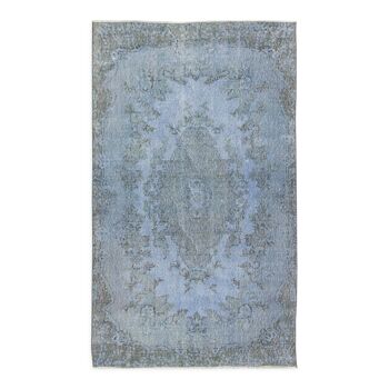 Hand-knotted turkish rug over-dyed in light blue