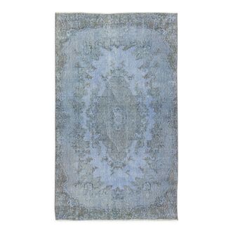 Hand-knotted turkish rug over-dyed in light blue