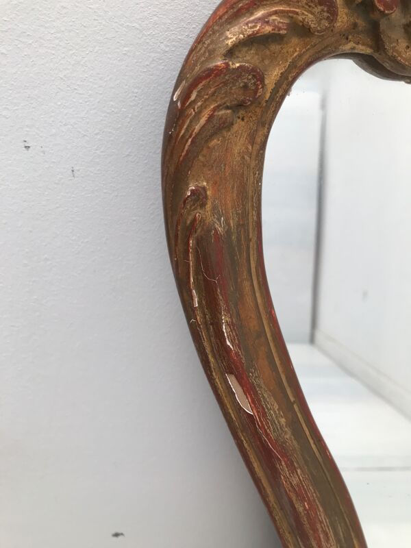 Miroir en bois doré décor coquille Louis XIV