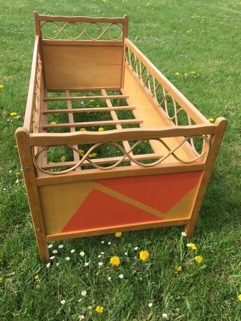 Wood and rattan baby bed