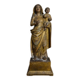 Ancient statue of the Virgin and Child in polychrome and gilded carved wood.
