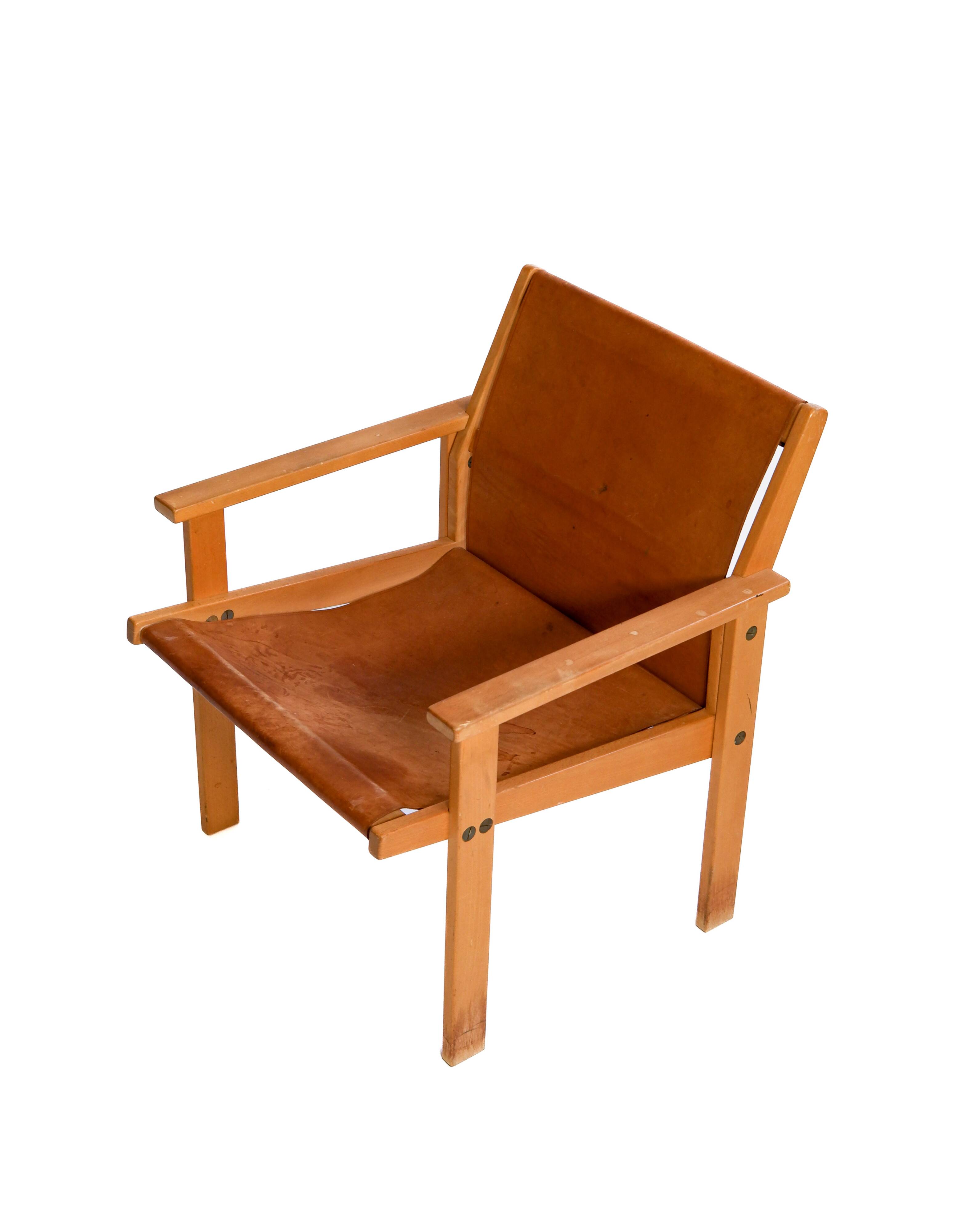 Rare Hans Agne Jakobsson armchair in leather and wood. Circa 1970