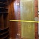 Antique mahogany secretary, upholstered flap and interior storage