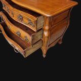 Solid wood commode in an antique style.