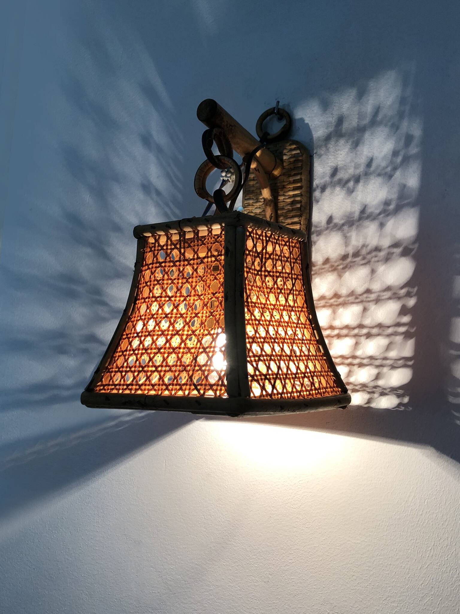 Pair of rattan and cane lantern wall lights. 1950s-1960s