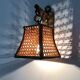 Pair of rattan and cane lantern wall lights. 1950s-1960s