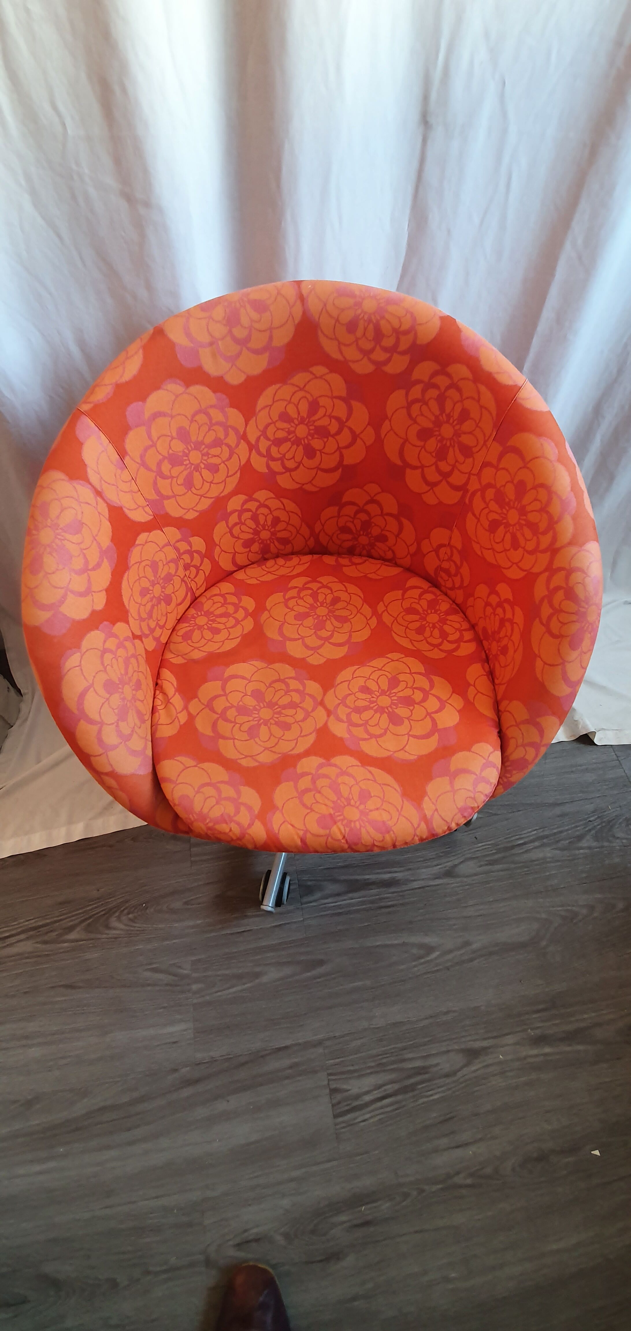 Seventies wheeled basket armchair