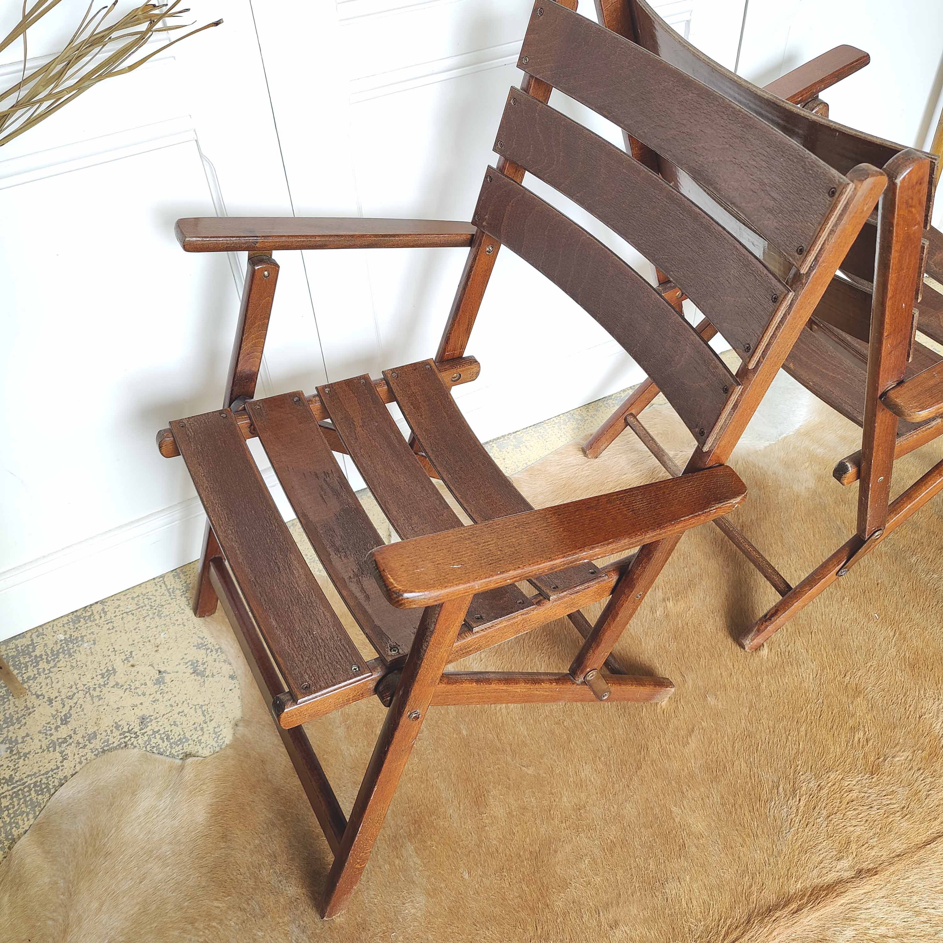 Pair of folding wooden armchairs