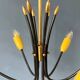 Vintage yellow spider suspension from the 1950s.