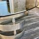 Vintage chrome metal coffee table and smoked glass