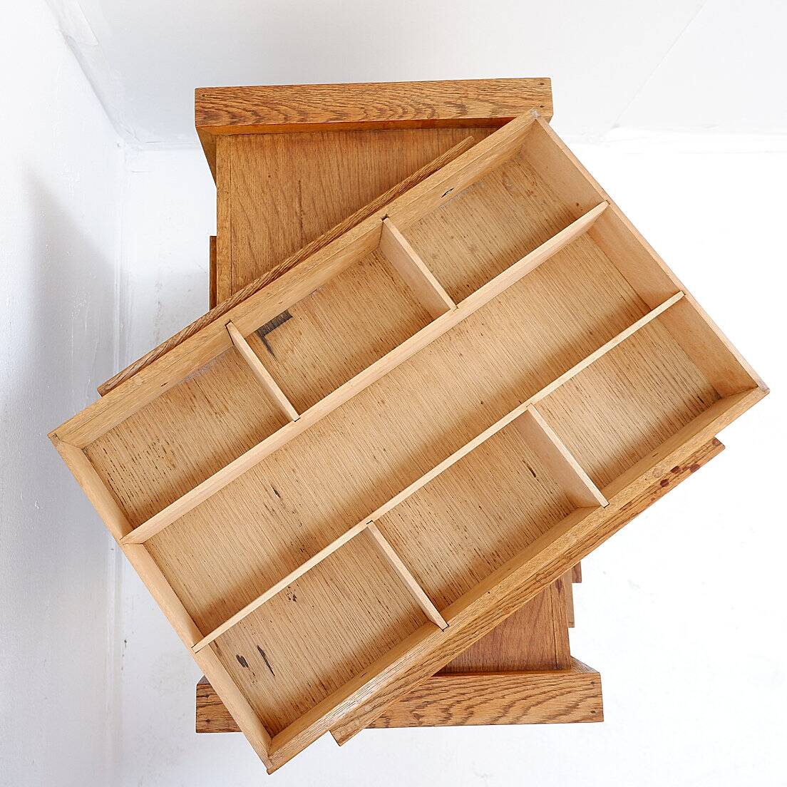 1960s wooden sewing cabinet with double-sided drawers