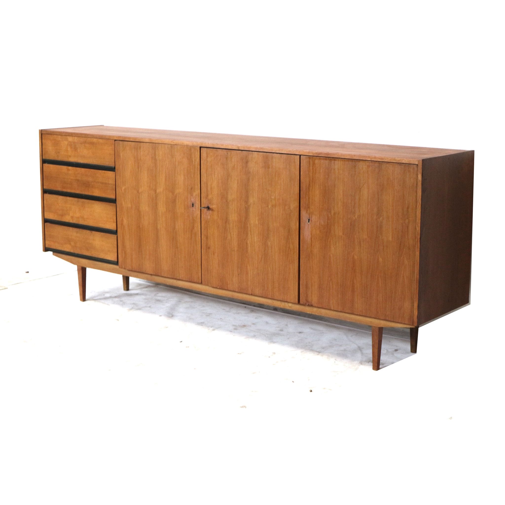 Large vintage sideboard with drawers and doors made in the 60s