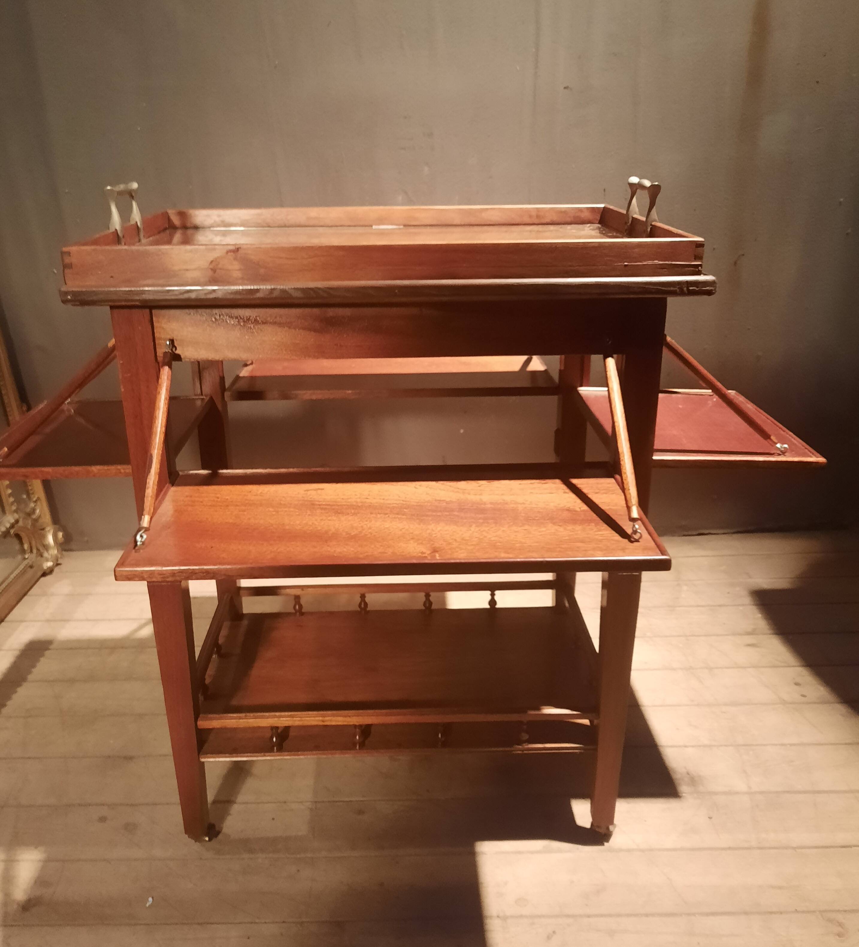 Sideboard with four drop-leaves