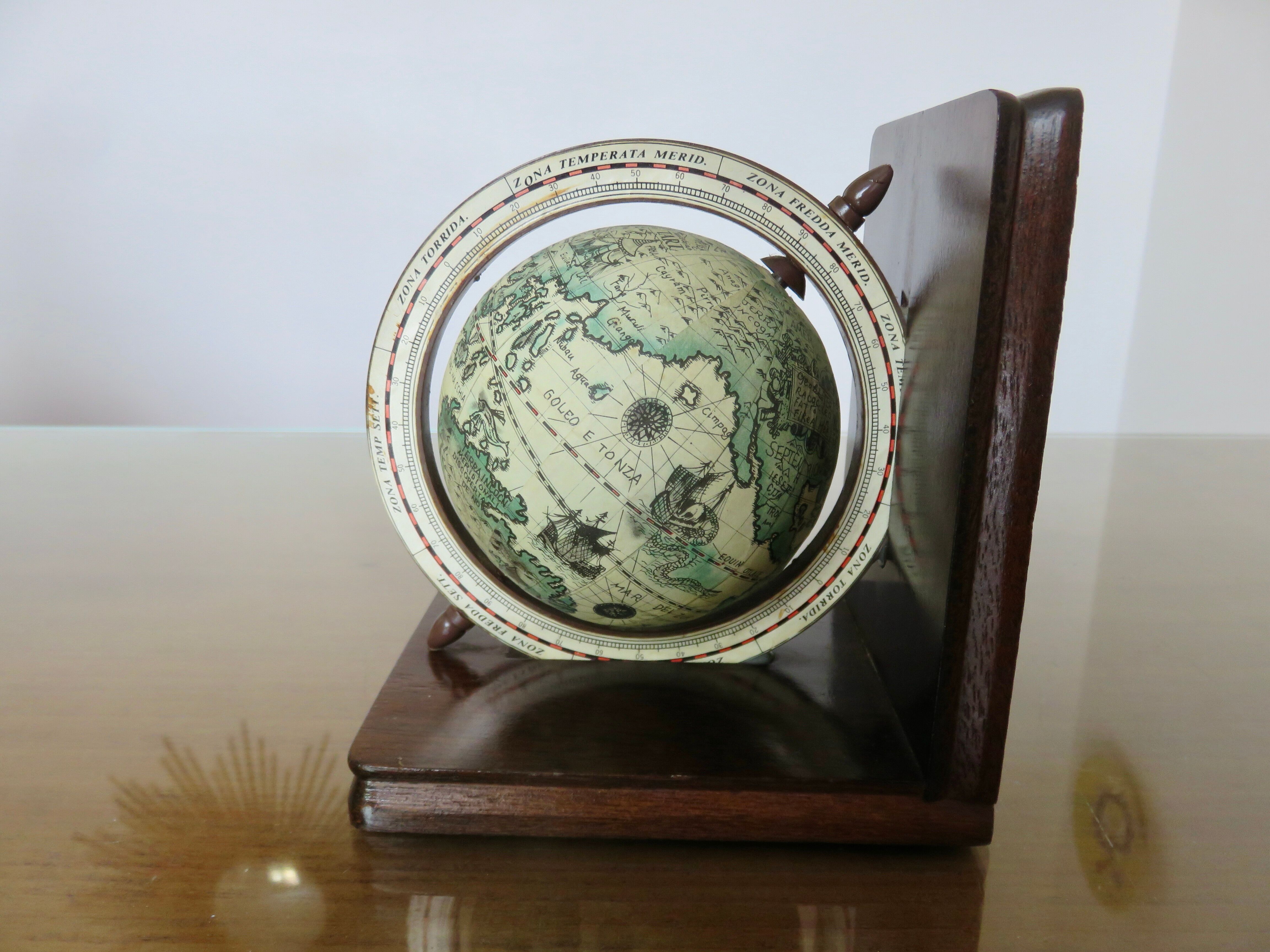 Pair of wooden bookends "globe" from the 1970s.