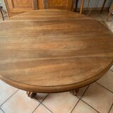 Old table slightly oval cherry tree with central foot with 2 extensions