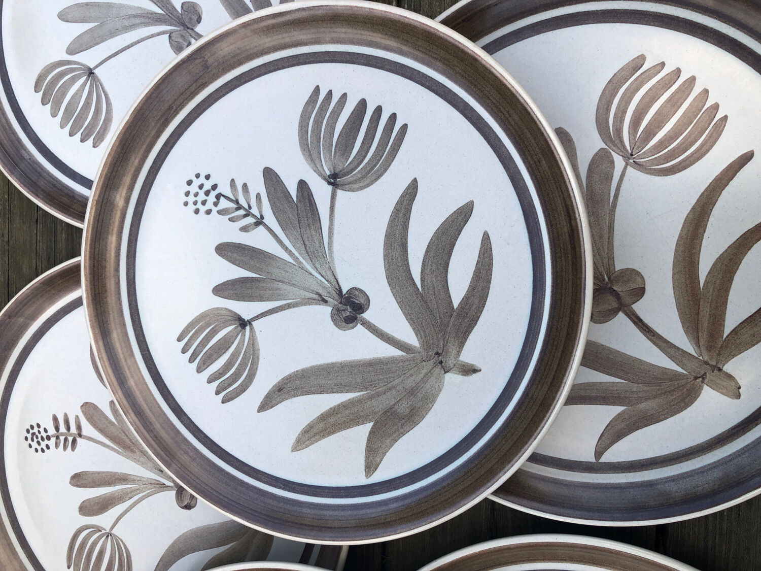 7 Longchamp stoneware plates