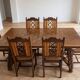 Dining table set with 6 chairs in cherry wood.