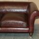 Vintage Art Deco leather sofa, three-seater, feather cushions.