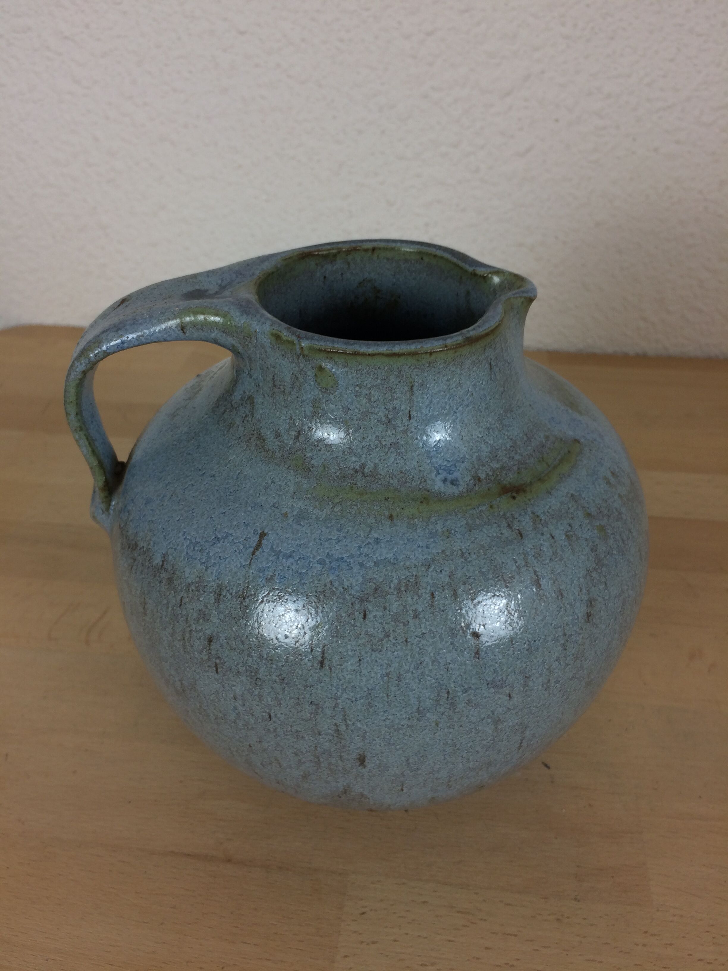 Blue ceramic ball vase signed