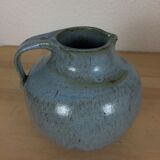 Blue ceramic ball vase signed