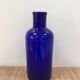 Large blue pharmaceutical vial