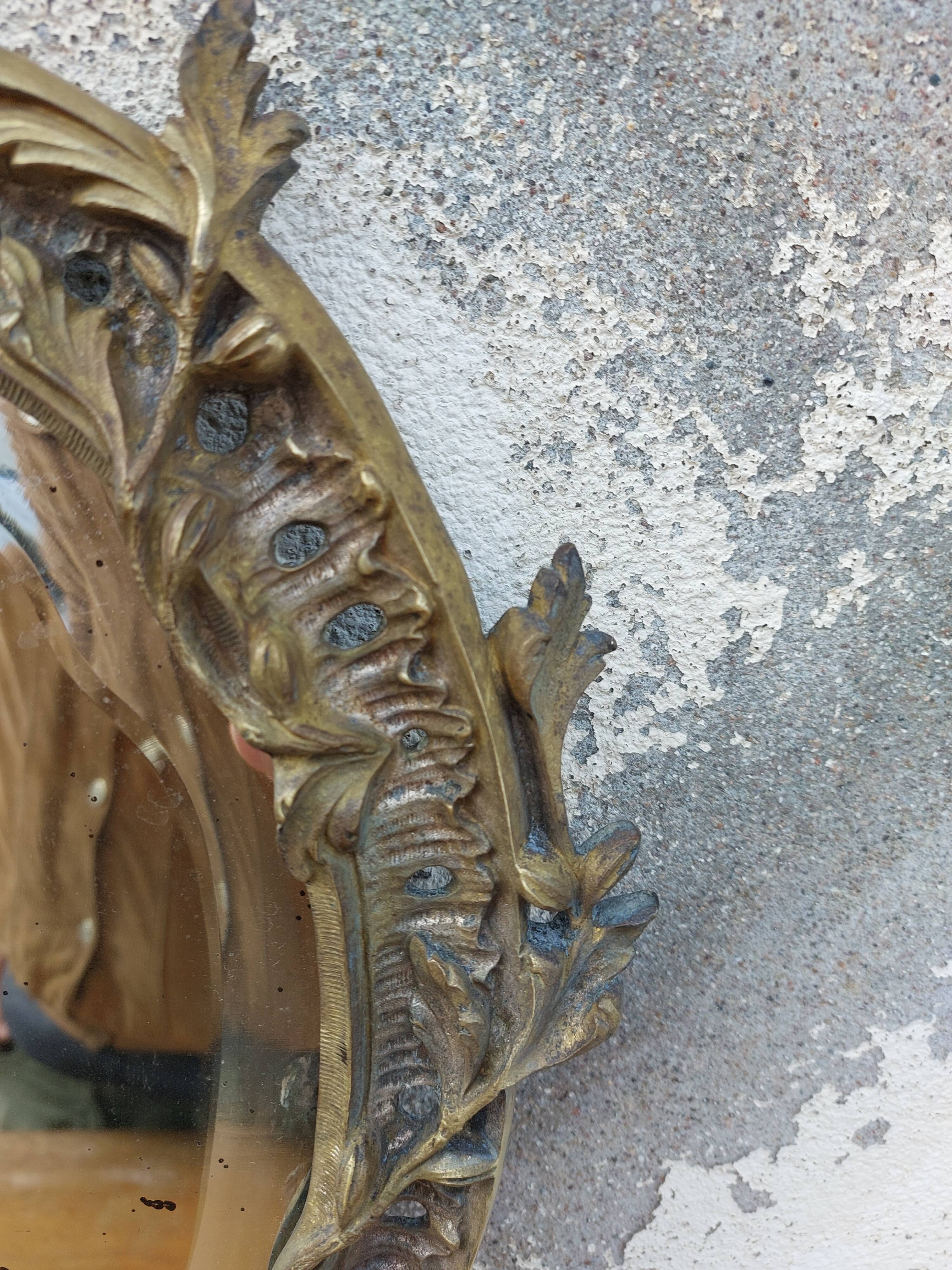 Miroir biseauté en bronze Louis XV 19ème