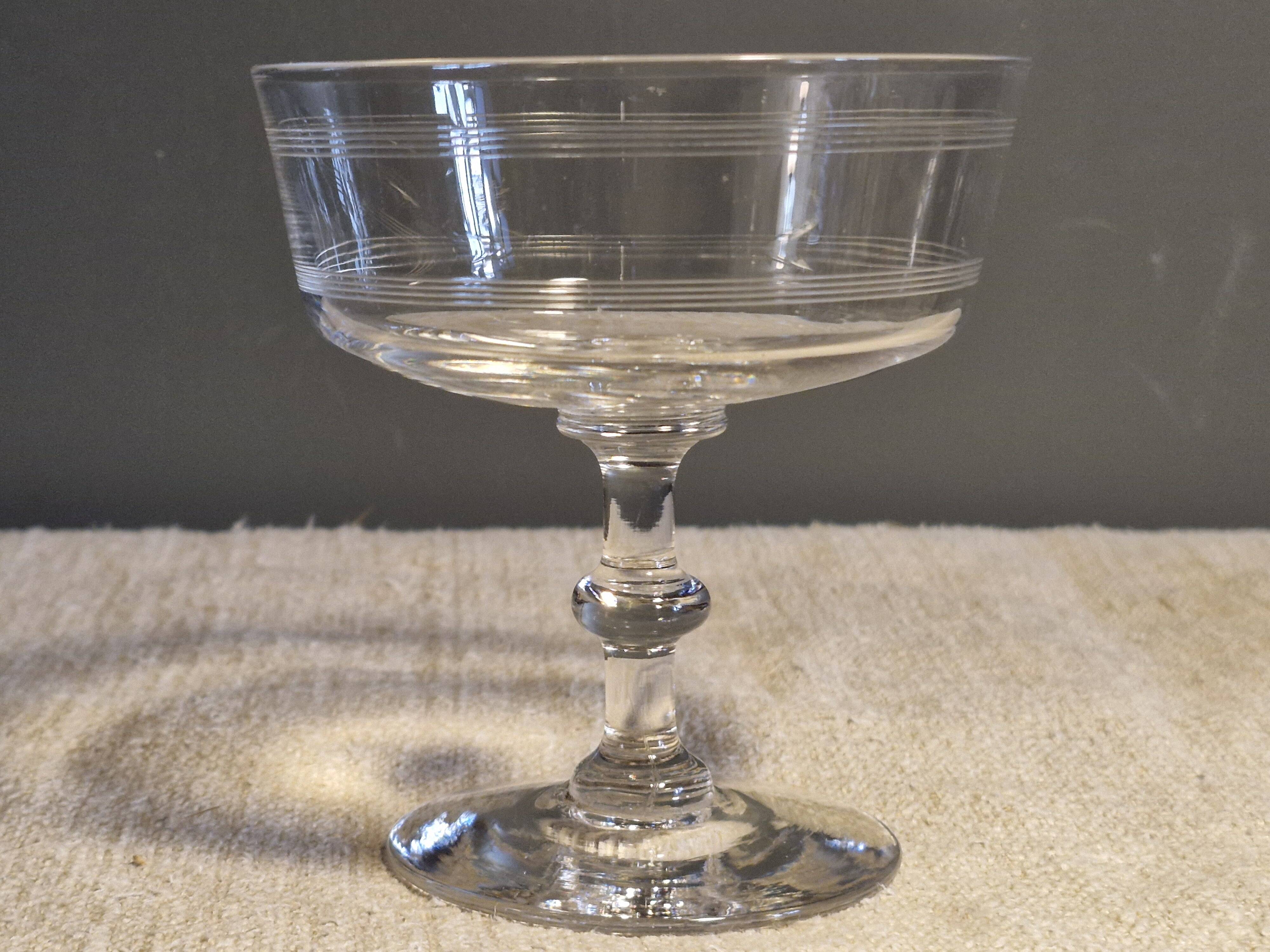 7 crystal champagne coupes from Baccarat - engraved with fillets