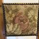 Antique chair with upholstered fabric seat