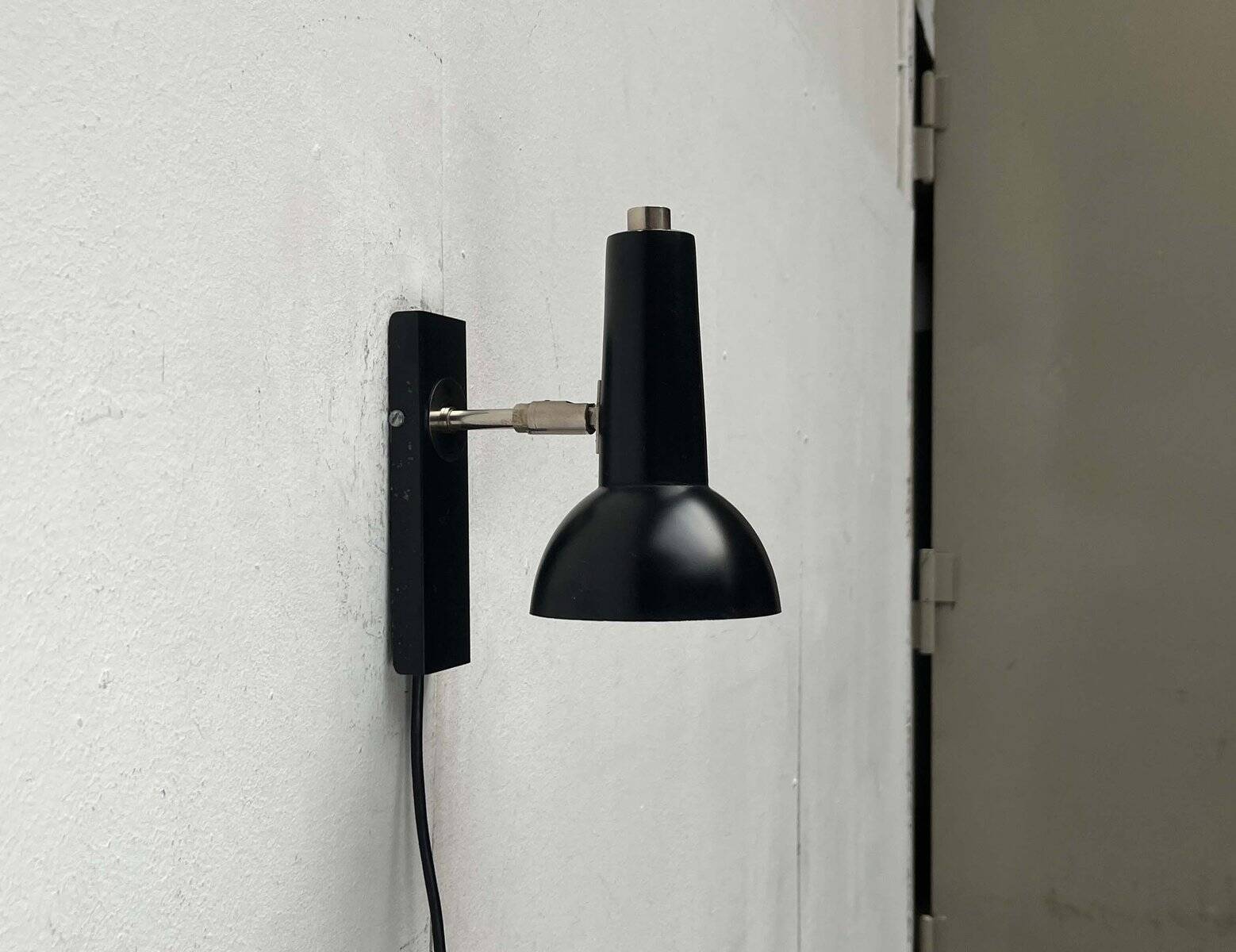 Mid-century German black minimalist wall lamp by Hustadt, 1960s.