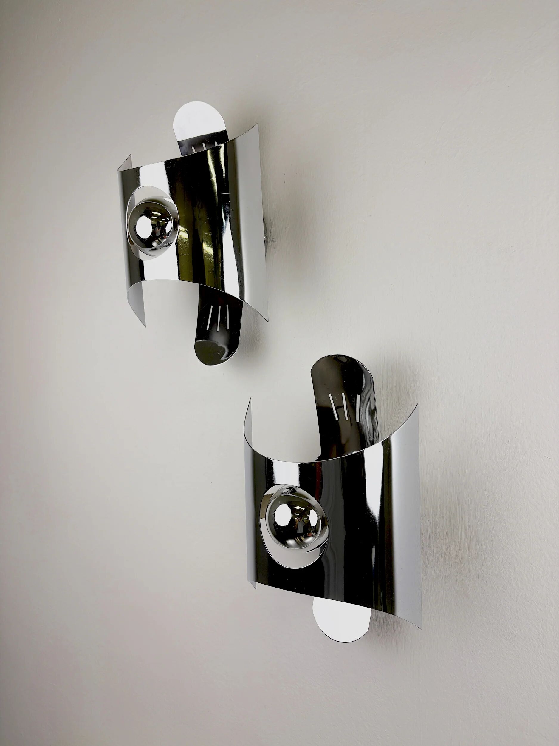 Pair of chromed space age wall lights, Italy, 1970s