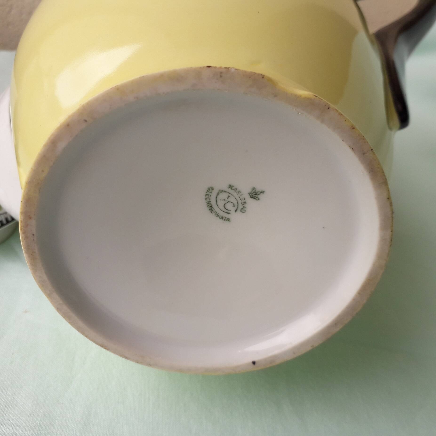 Coffee pot or teapot, sugar bowl and milk jug in porcelain.