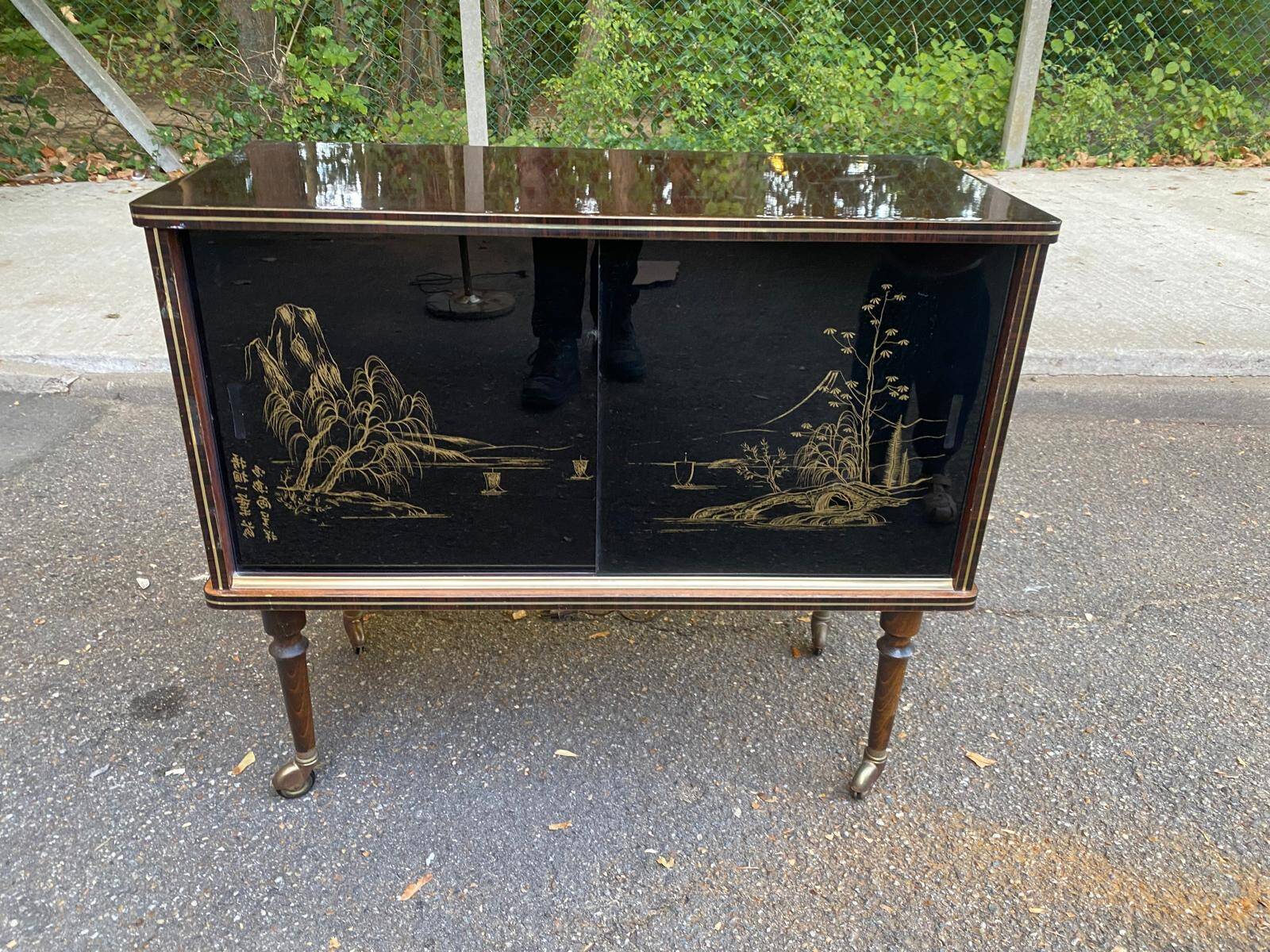 Illuminated bar cabinet Hollywood Regency black and gold 1970