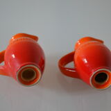 Le Creuset orange advertising salt and pepper
