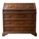 Antique wooden secretary with a drop-down front and drawers.