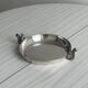 Small shiny silver metal dish