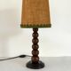 Art Deco lamp in turned wood from the 1930s