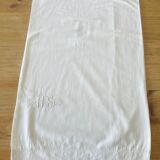 Old bolster case with lace edge and embroidered.