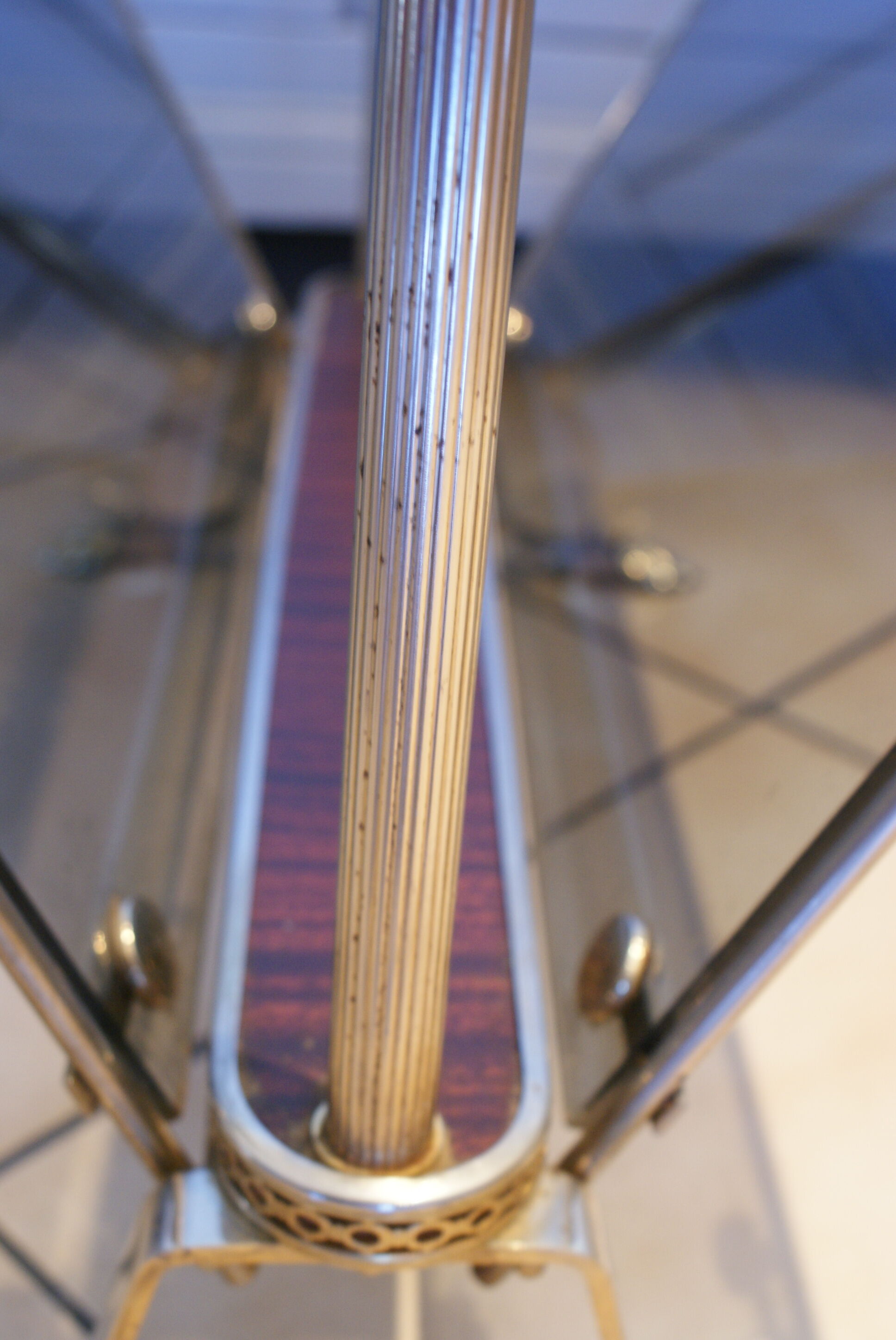 Vintage smoked glass and metal magazine rack