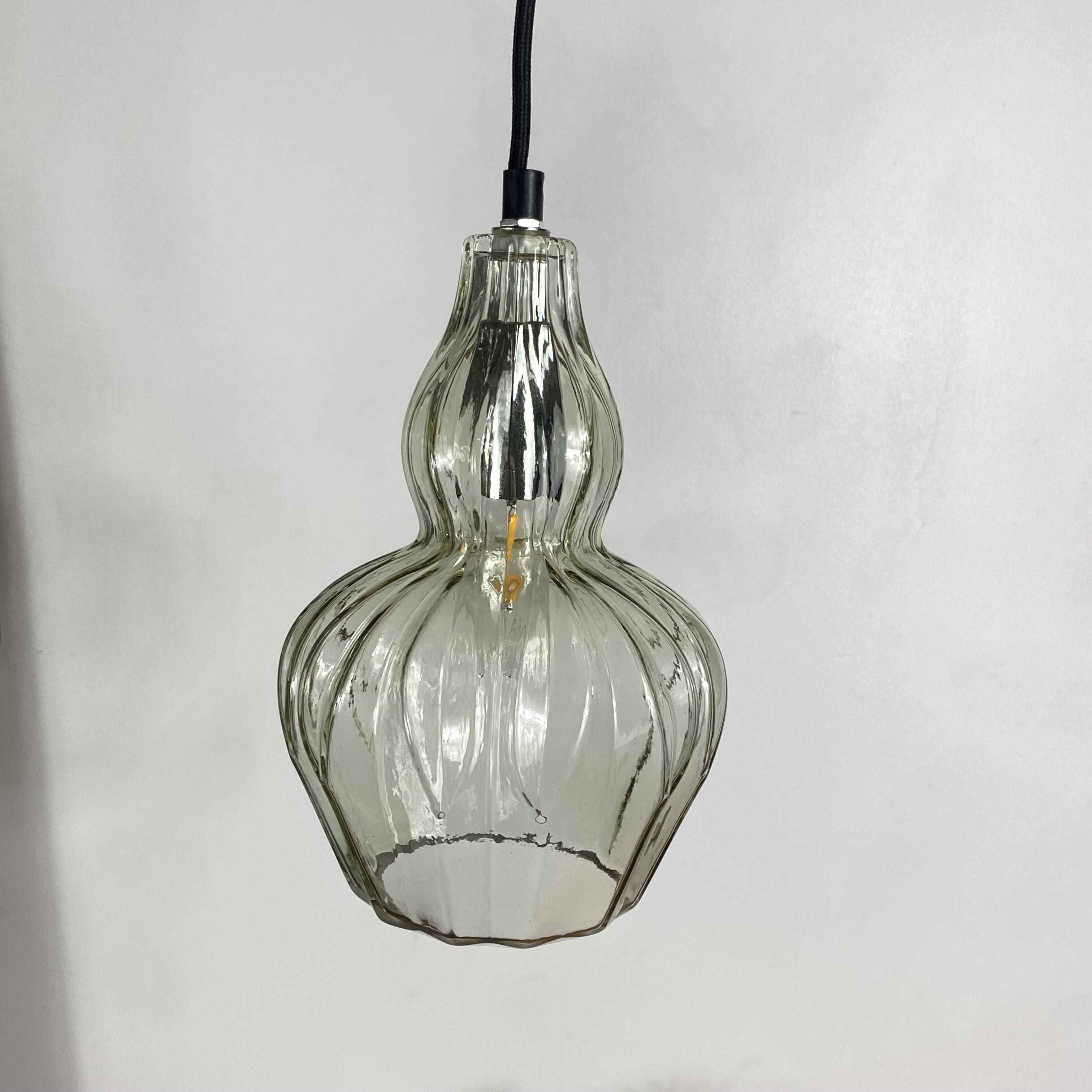 Pair of vintage glass pendant lights.