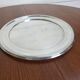 Round silver-plated metal tray from the mid-20th century