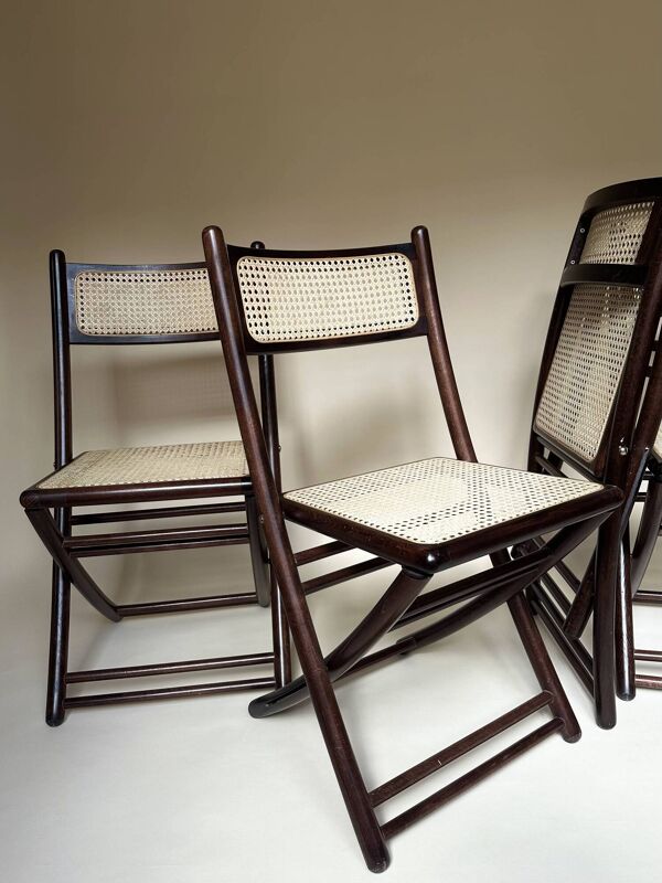 Set de quatre chaises pliantes en bois et cannage