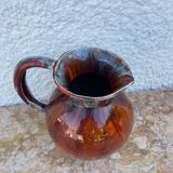 beautiful red ceramic pitcher signed