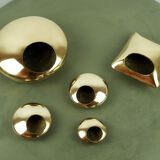 Set of pebble ashtrays in gilded bronze
