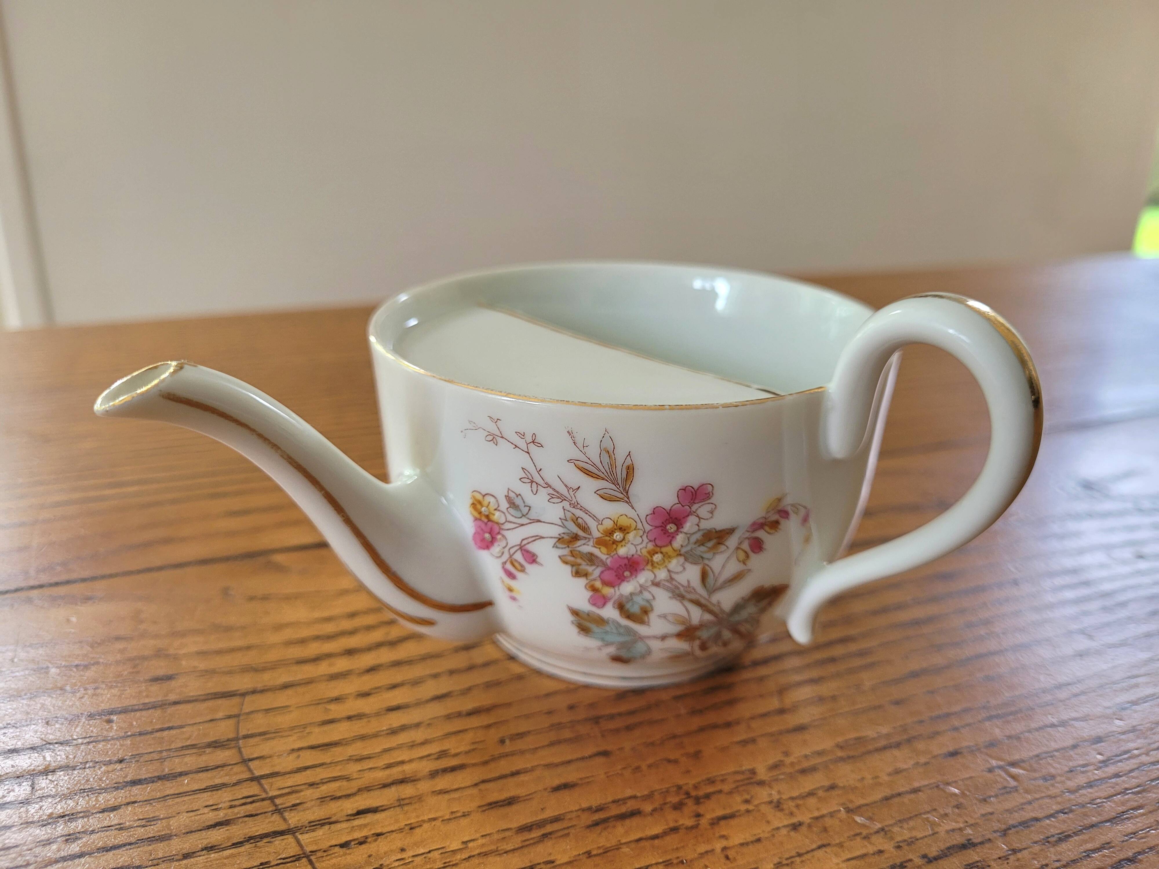 Antique porcelain duck mug for the sick
