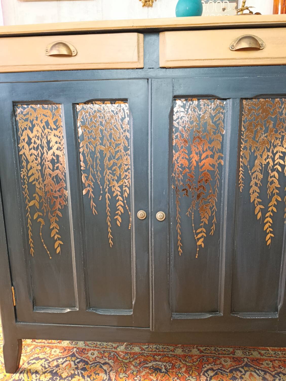 Black Parisian buffet with copper foliage