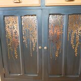 Black Parisian buffet with copper foliage