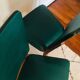 Two 1950s chairs made of wood and skai