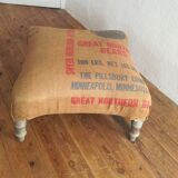 Ottoman pouf rests foot